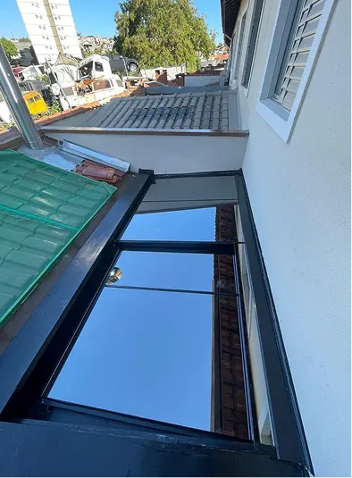 Cobertura de vidro em projeto residencial